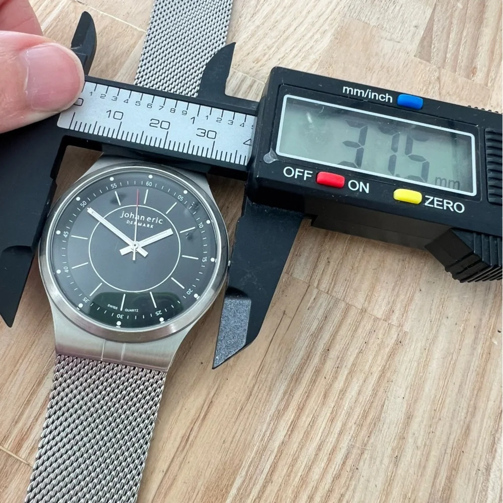 Johan Eric Denmark black dial stainless steel Swiss dress watch NEW BATTERY